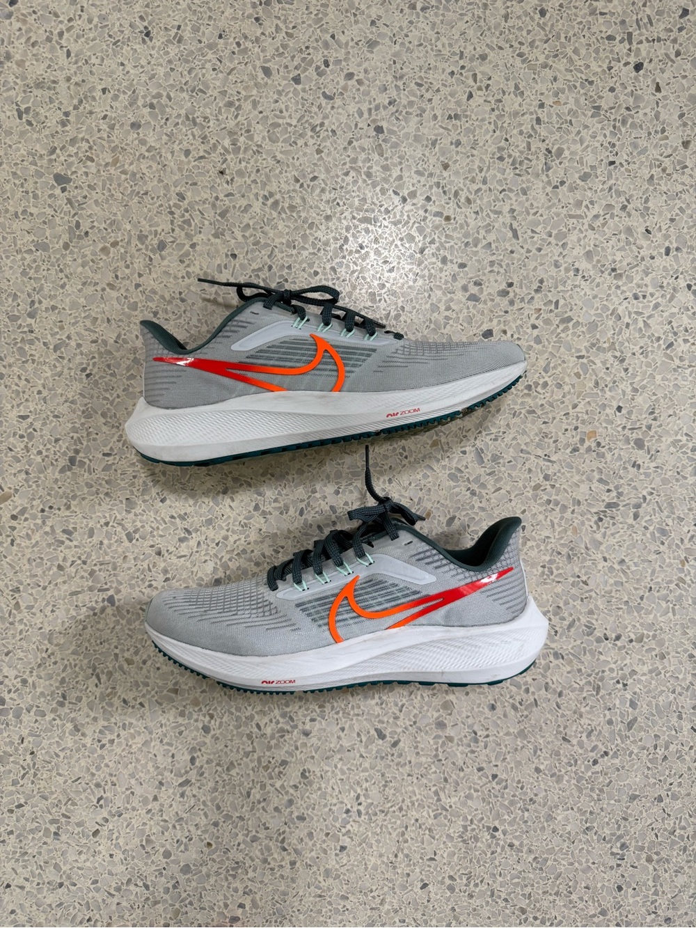 Nike Air Zoom Pegasus 39 Grey Running Shoes with Orange Swoosh